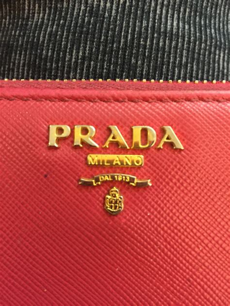 how to tell fake prada wallet|false prada purse.